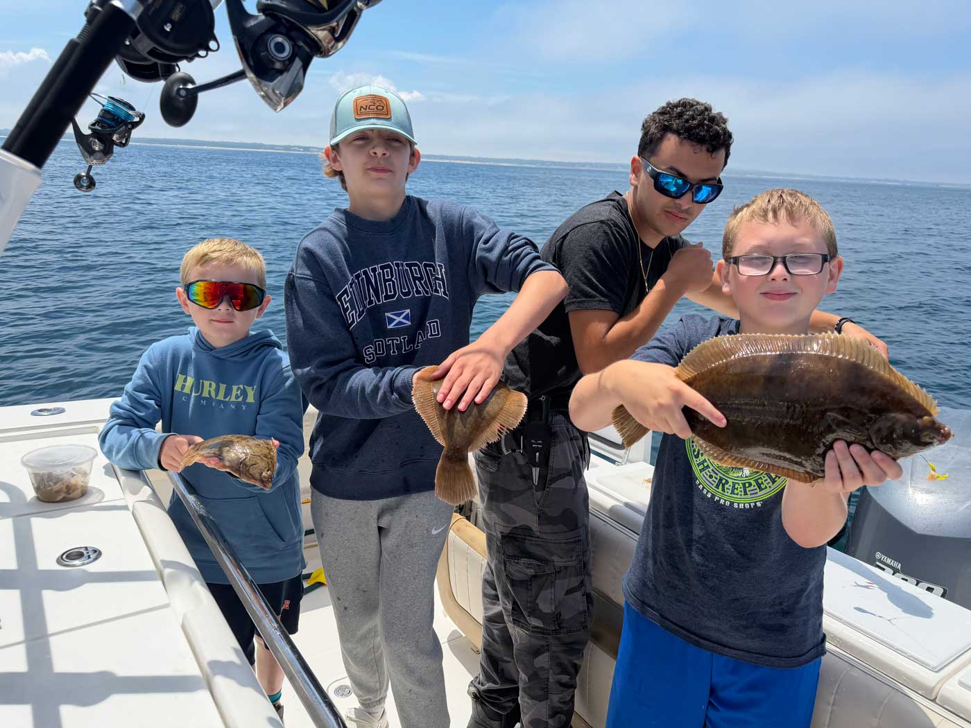 jackie lu charters - kids with their catch!